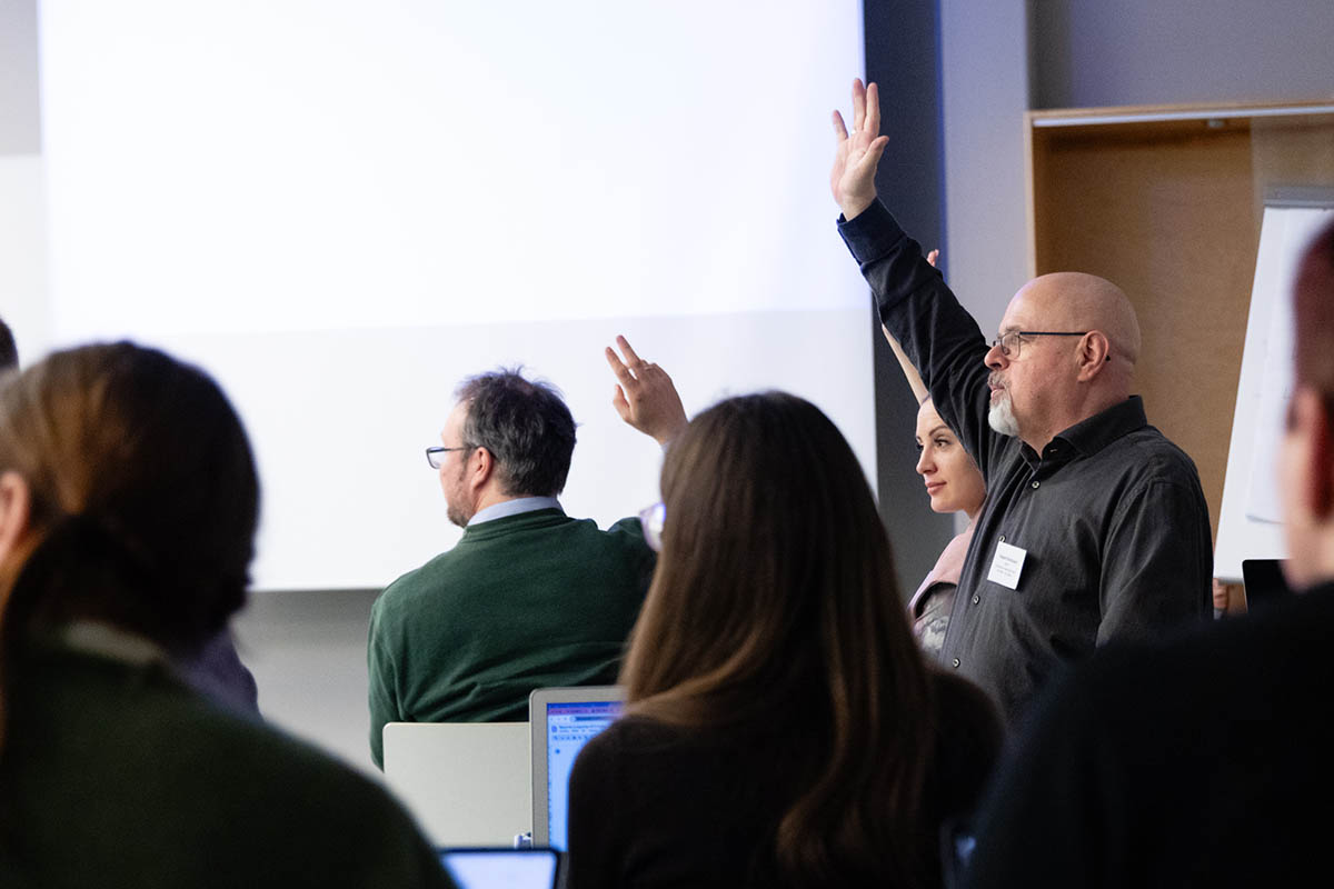 Teachers and experts actively participating in discussion